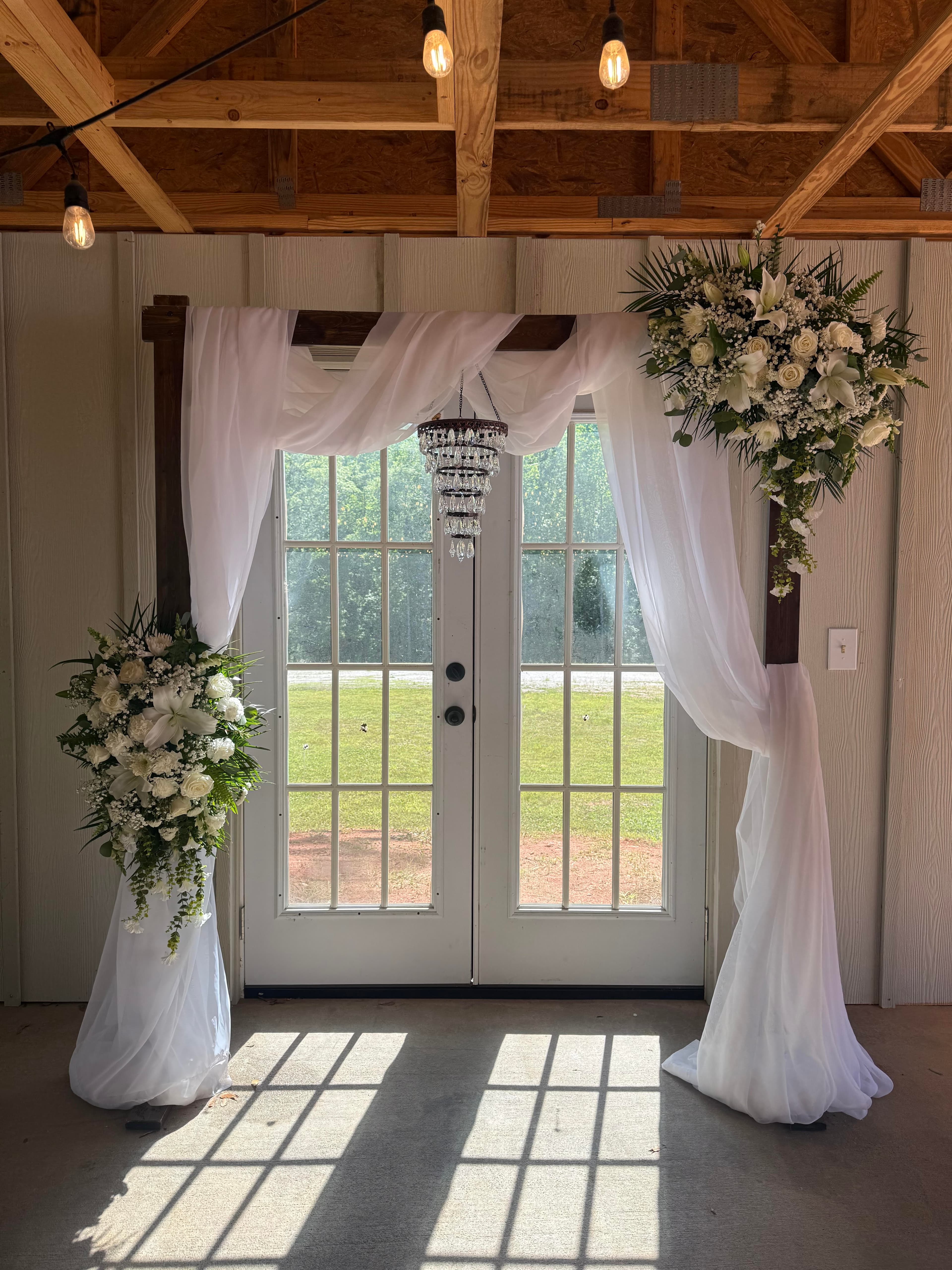 Barn Arch with Floral Pedestals